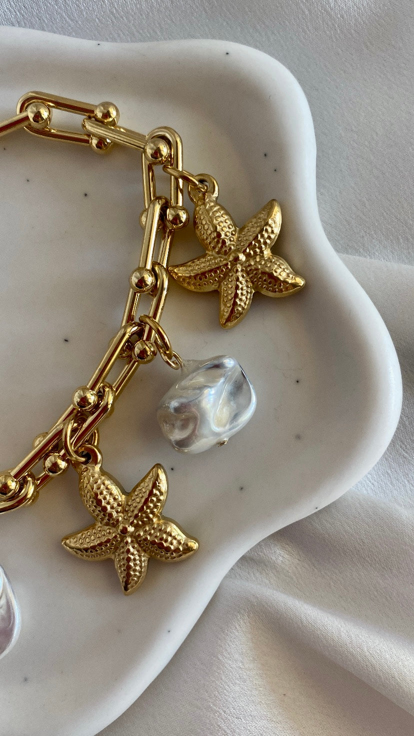 HOLIDAY stainless steel bracelet with Mother of Pearls and starfish charms