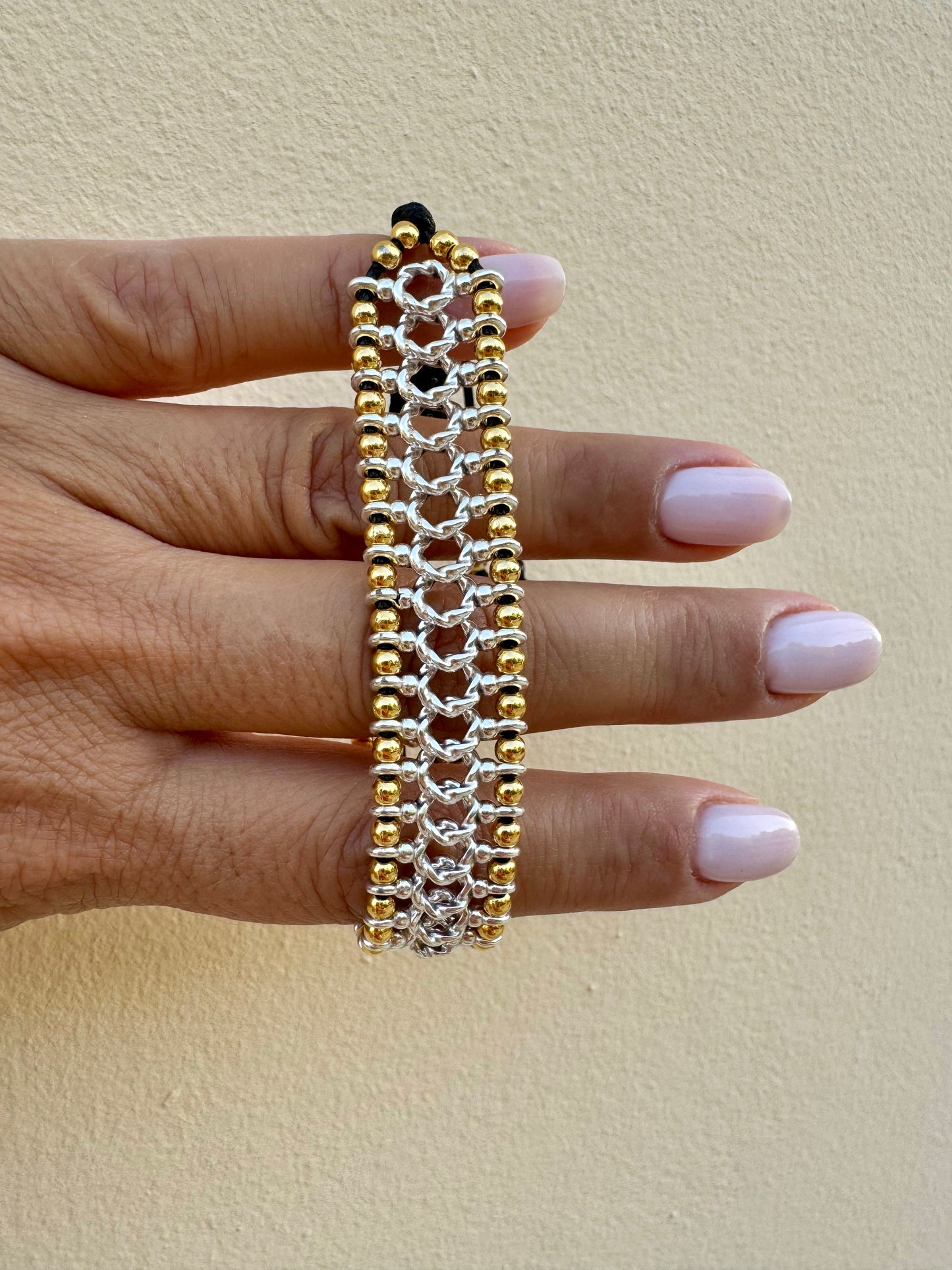 BRAID bracelet with gold and silver beads