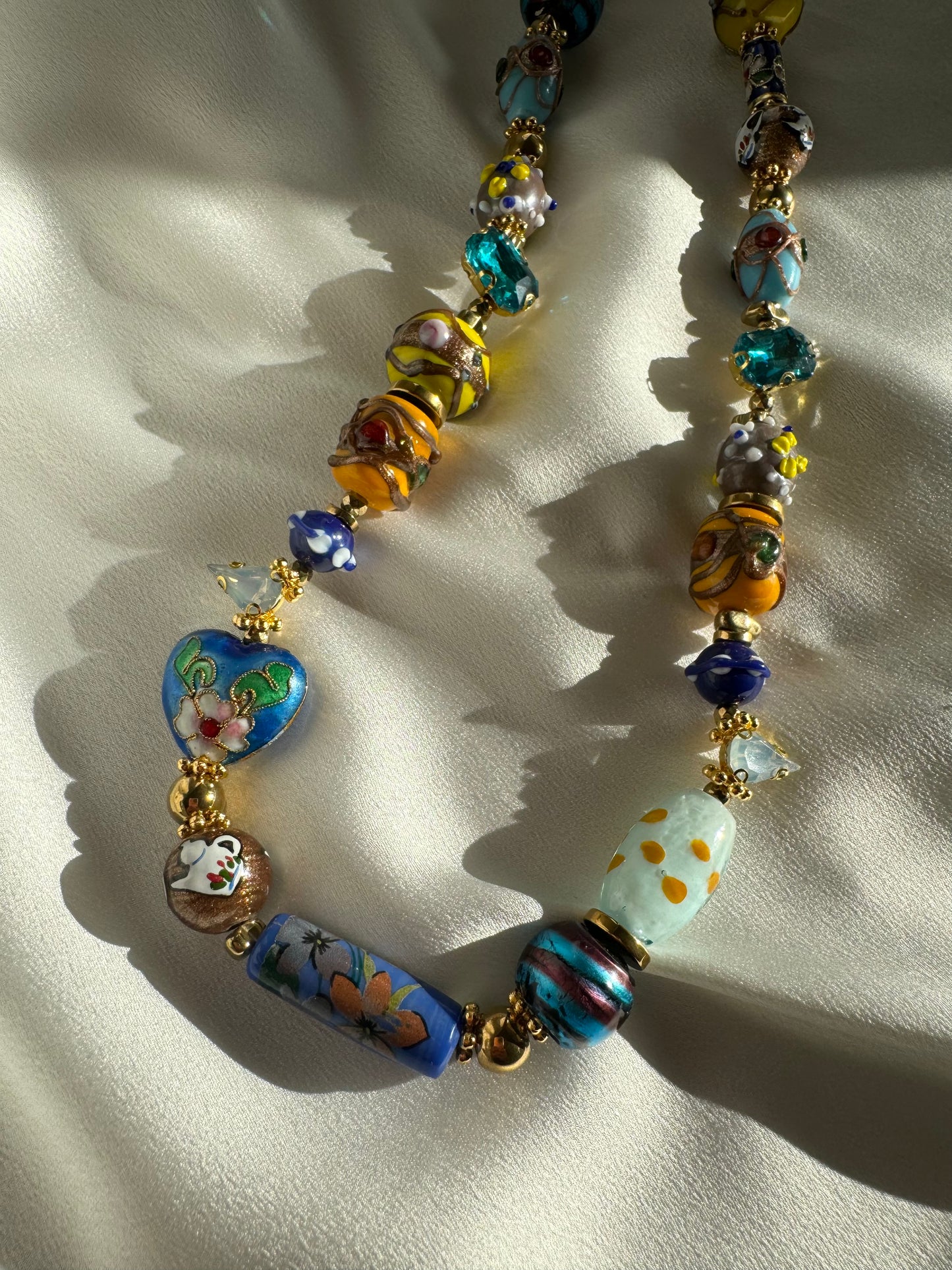 Handmade SAMIRA necklace with colorful Murano beads, gold hematite, and crystals