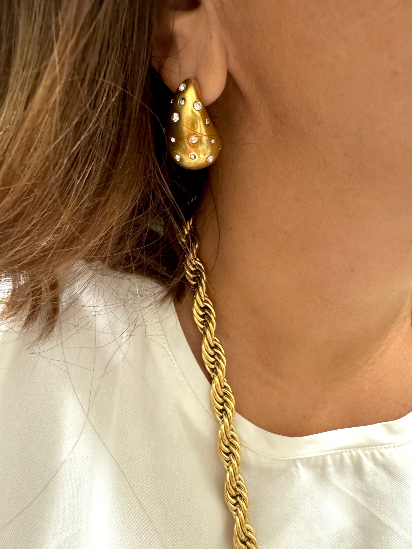 TWIST Statement gold chain necklace styled with black dress for evening outfit