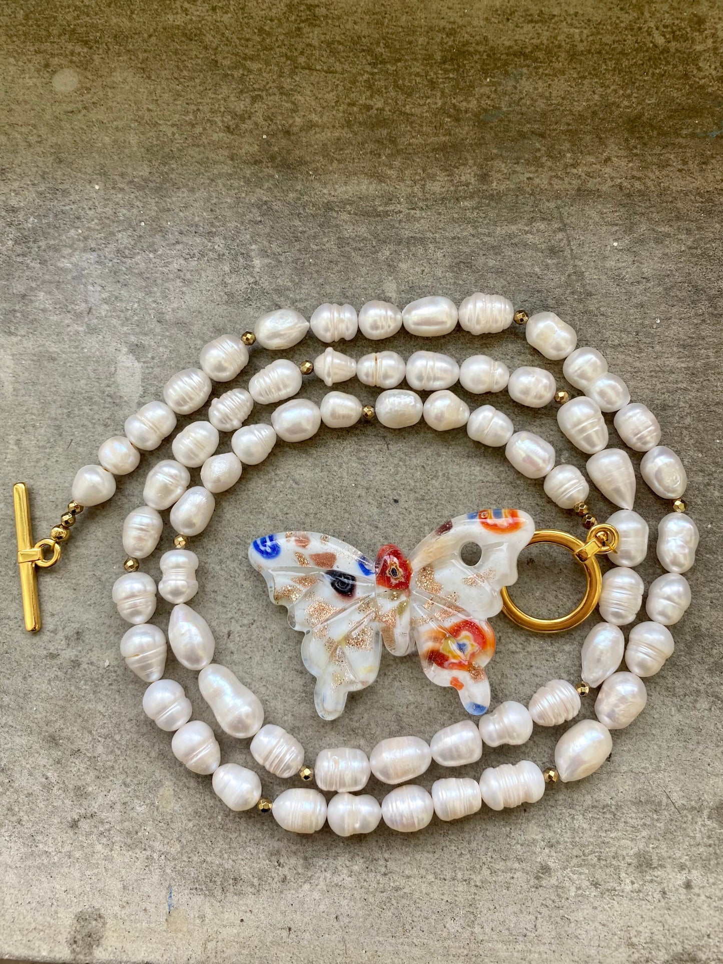 GIGI long pearl necklace with Murano glass butterfly charm