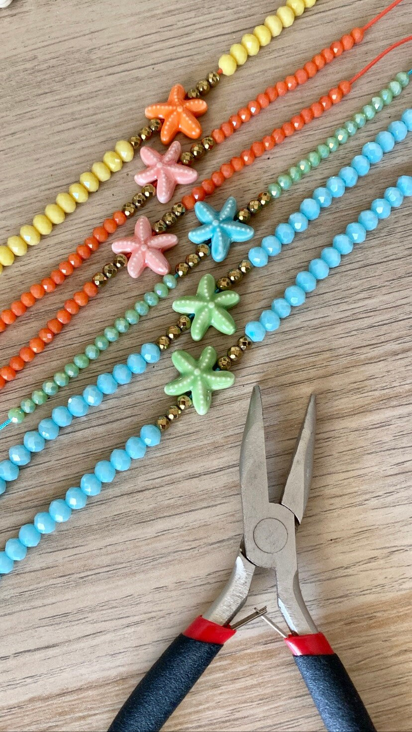 SPETSES crystal bracelets with hematite and ceramic starfish elements