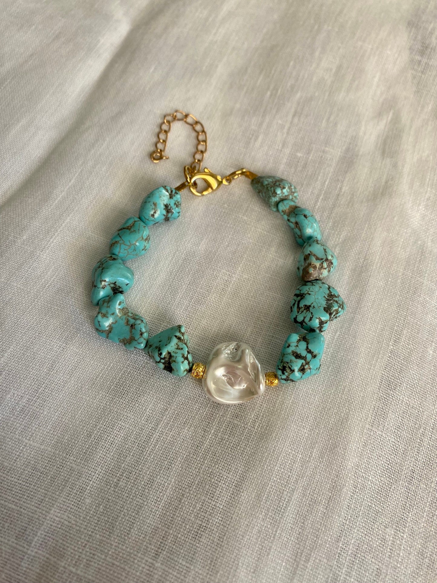 LIDIA turquoise bracelets with Mother of Pearl element and stainless steel charm