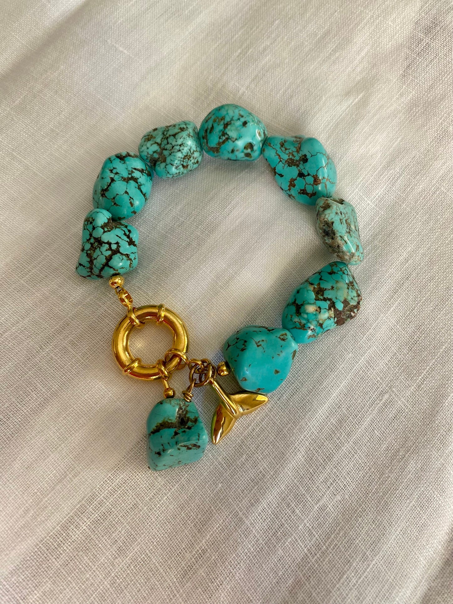 LIDIA turquoise bracelets with Mother of Pearl element and stainless steel charm