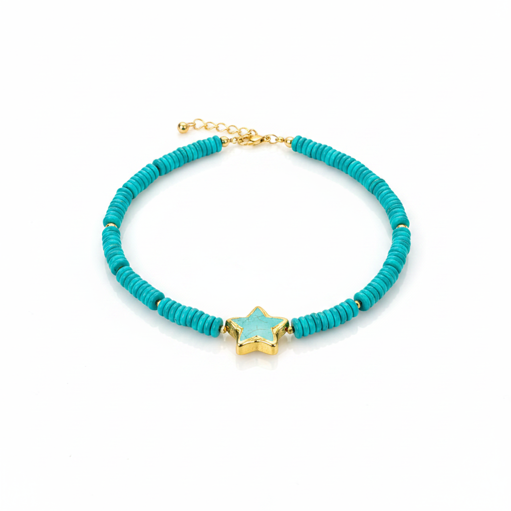 A turquoise beaded necklace with a gold star charm and gold chain extender, shown on a plain white background.
