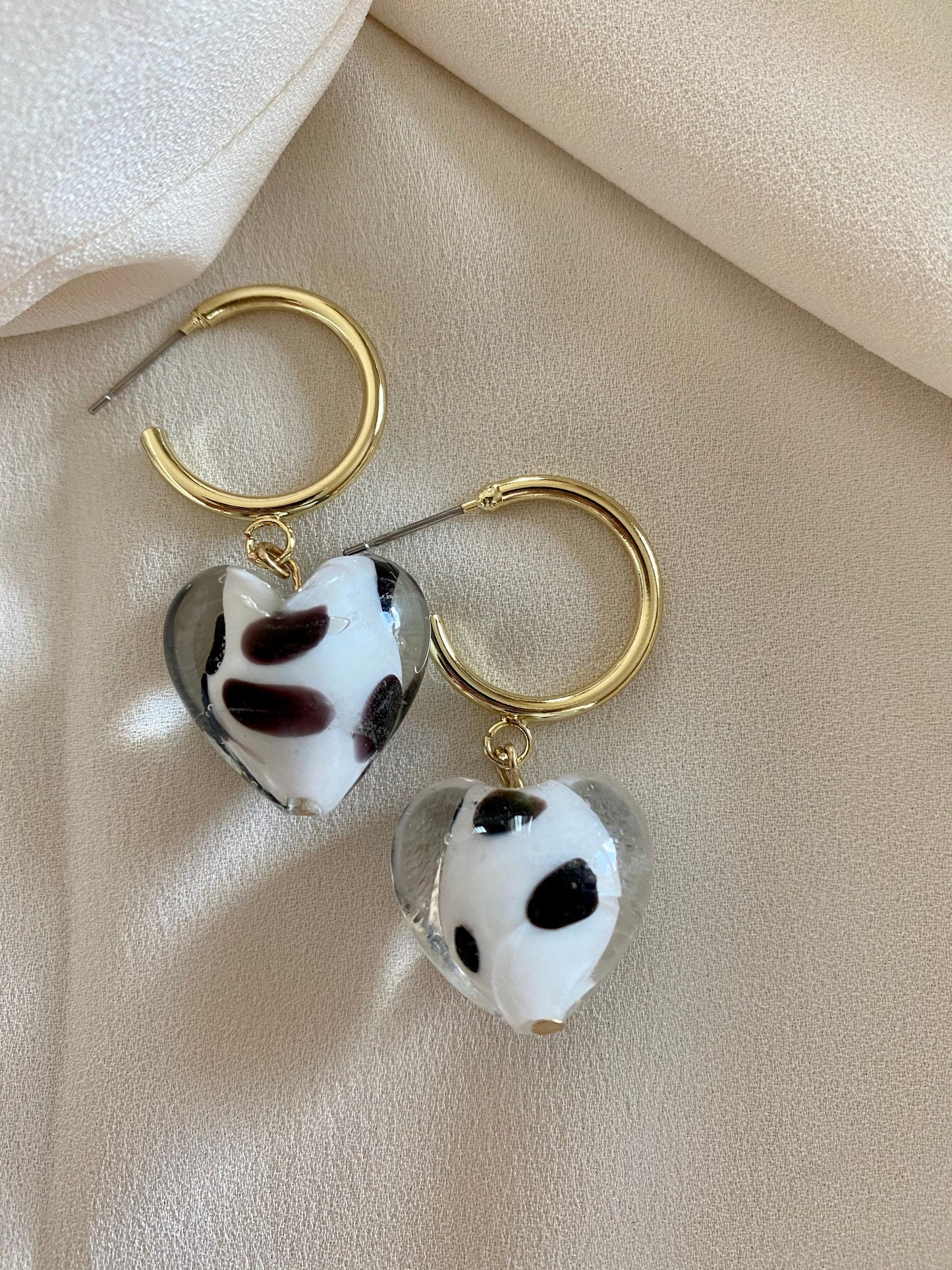 Murano heart earrings on gold hoops